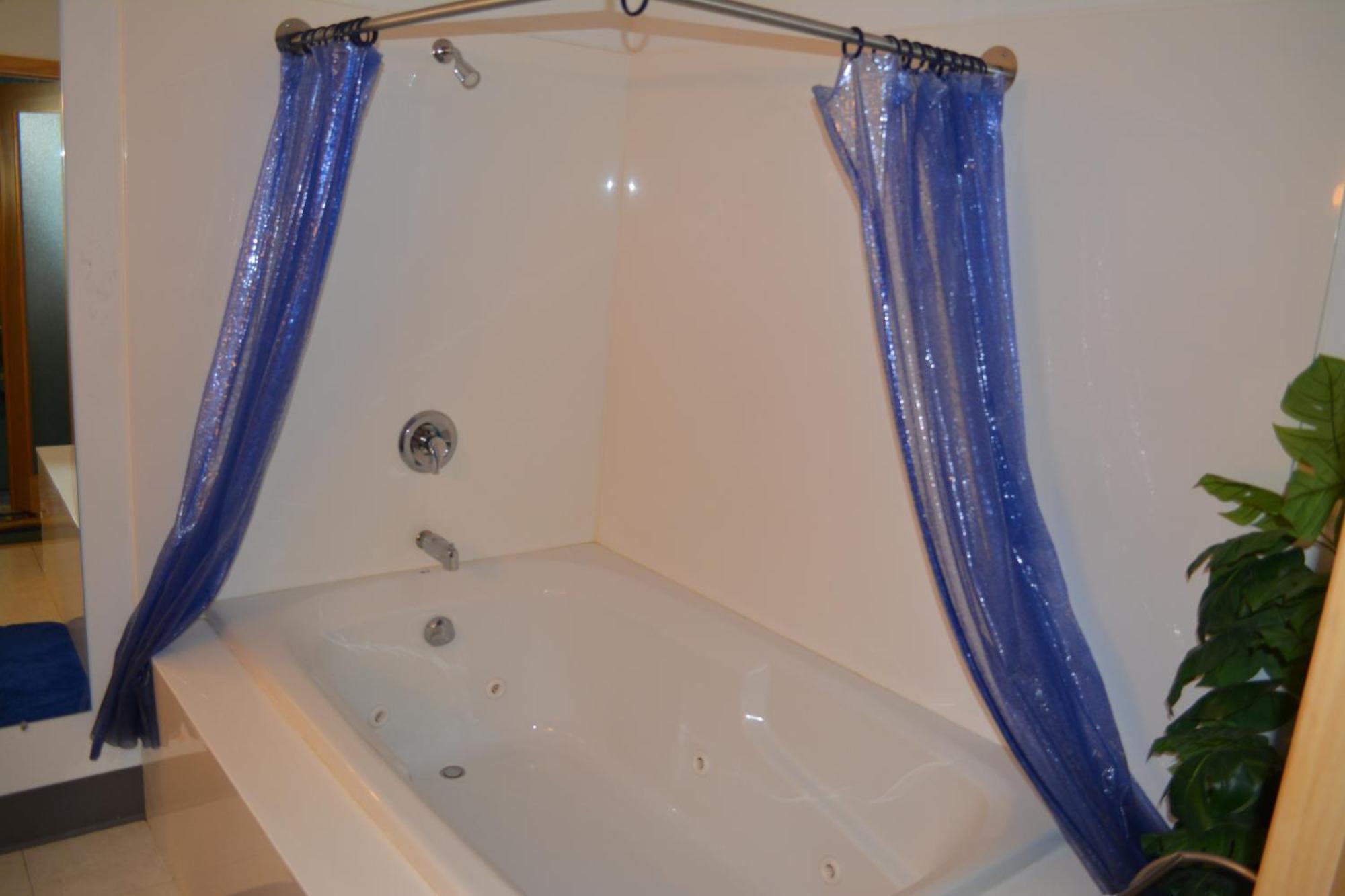 Bloomer Inn & Suites الغرفة الصورة