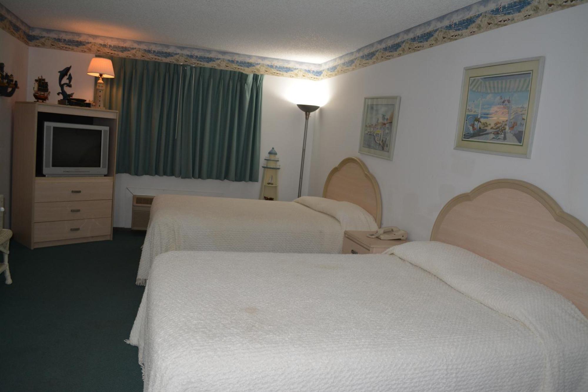 Bloomer Inn & Suites الغرفة الصورة